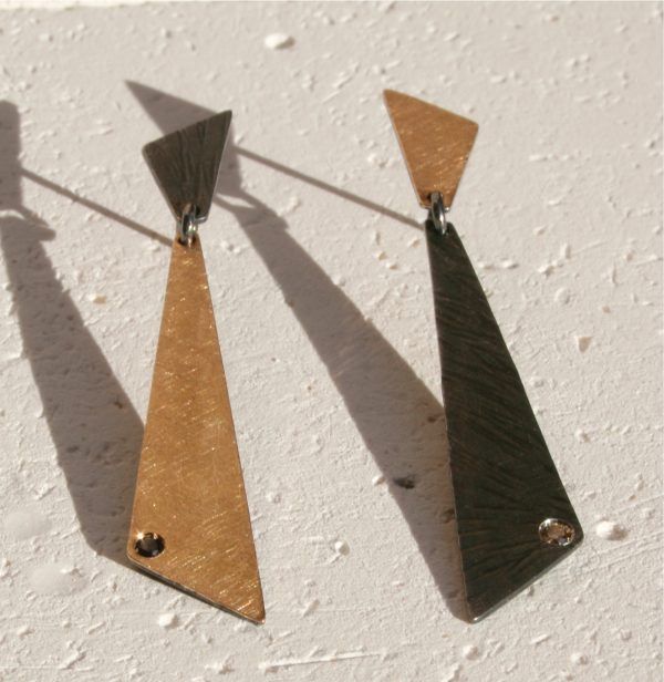 vela pendientes diamantes negros